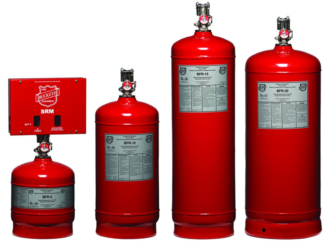 Buckeye kitchen fire suppression agent cylinders in four sizes beside a release module