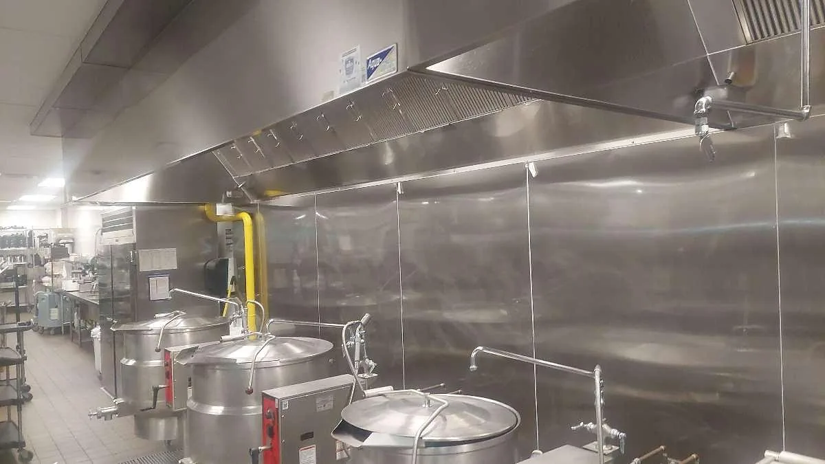 Boss Fire Protection commercial kitchen fire suppression system installed over a cookline in Dallas-Fort Worth, TX