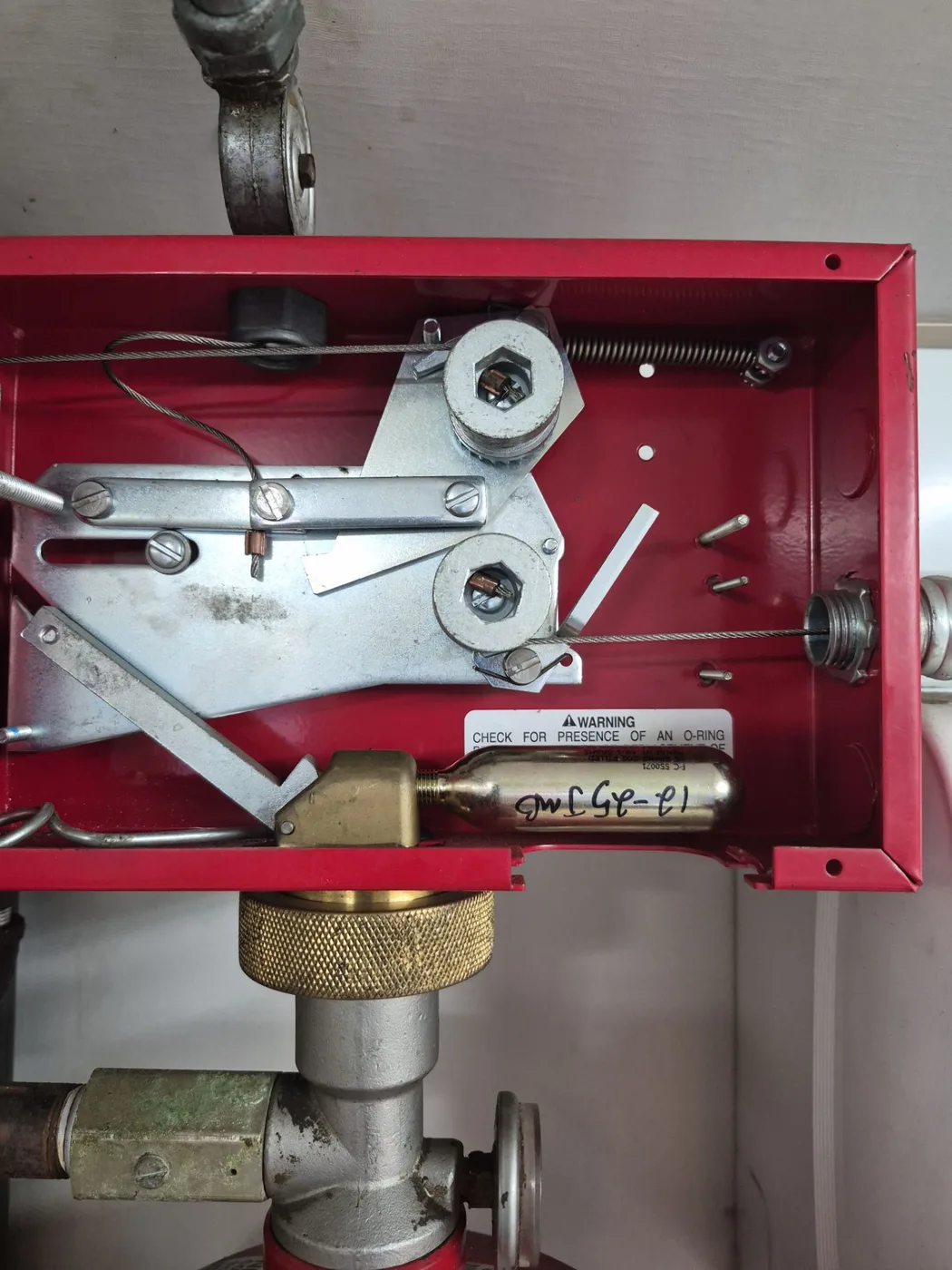 ProTex II fire suppression cylinder and control head installed in a food truck by Boss Fire Protection in Seagoville, TX