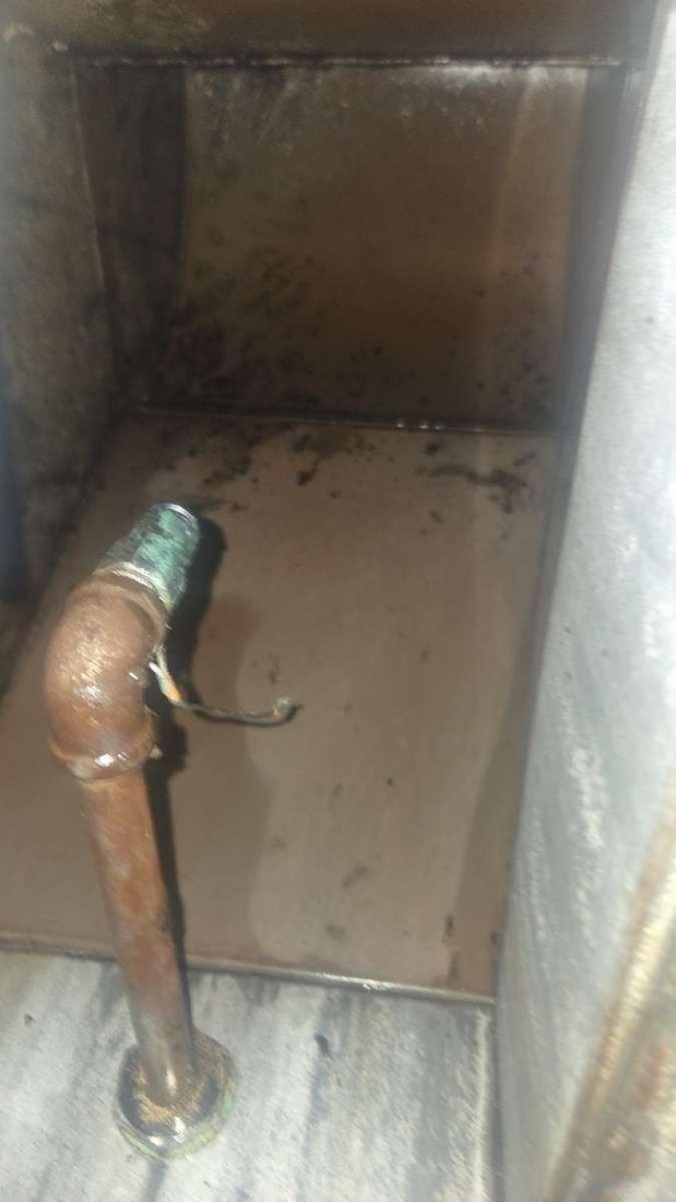 Commercial kitchen exhaust duct found with no fire suppression nozzle protecting it during a Boss Fire Protection visit in Dallas, TX