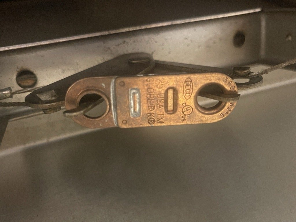 An out-of-date fusible link found by Boss Fire Protection on a scheduled service visit only days after a good tag in Prosper, TX